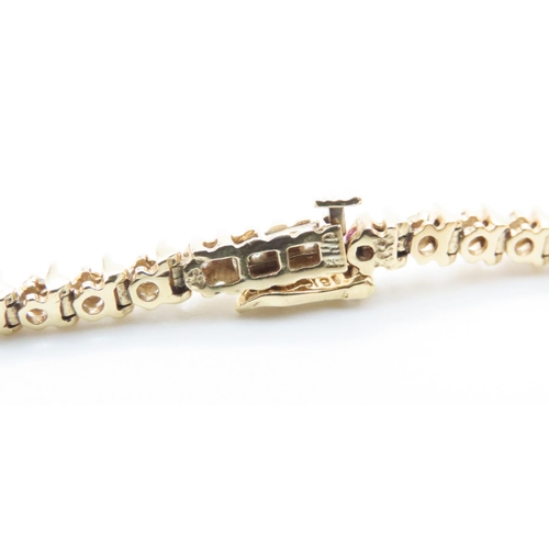 1057 - 18 Carat Yellow Gold Diamond Set Tennis Line Bracelet 19cm Long