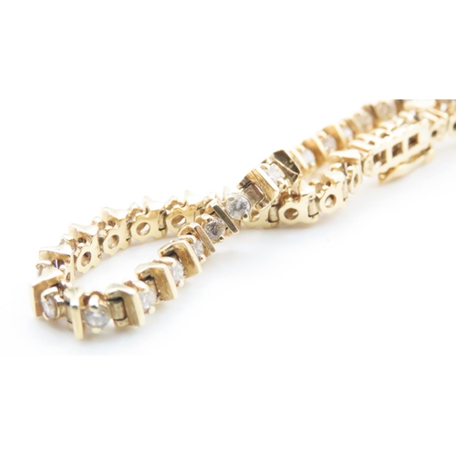 1057 - 18 Carat Yellow Gold Diamond Set Tennis Line Bracelet 19cm Long