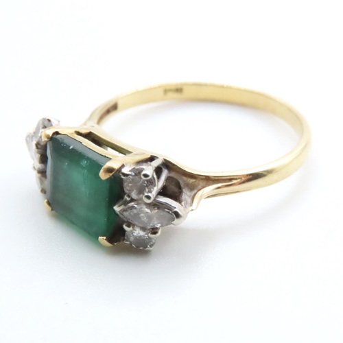 1058 - Emerald And Diamond Ring Attractively Detailed Mounted in 18 Yellow Gold Ring Size V