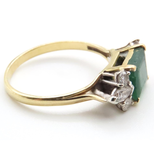 1058 - Emerald And Diamond Ring Attractively Detailed Mounted in 18 Yellow Gold Ring Size V