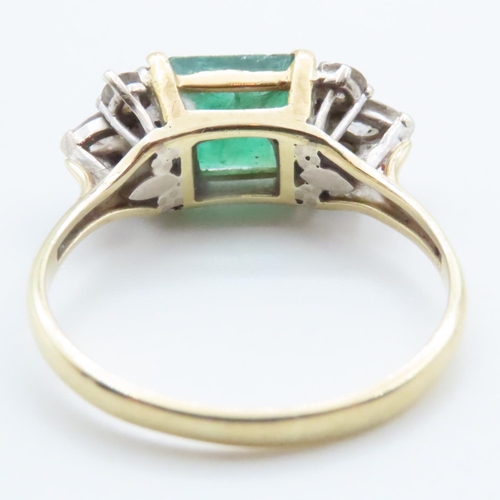 1058 - Emerald And Diamond Ring Attractively Detailed Mounted in 18 Yellow Gold Ring Size V