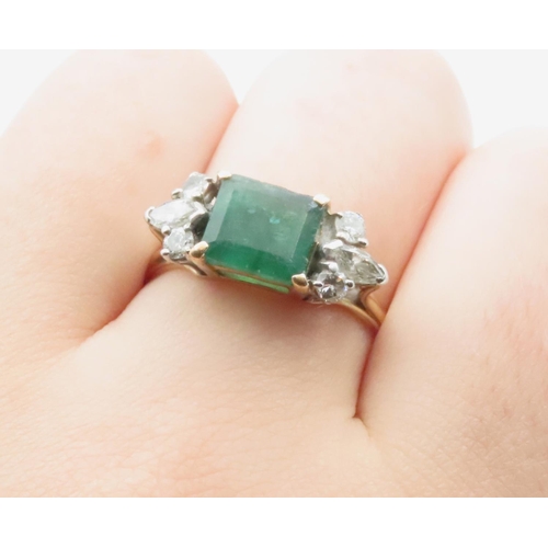 1058 - Emerald And Diamond Ring Attractively Detailed Mounted in 18 Yellow Gold Ring Size V