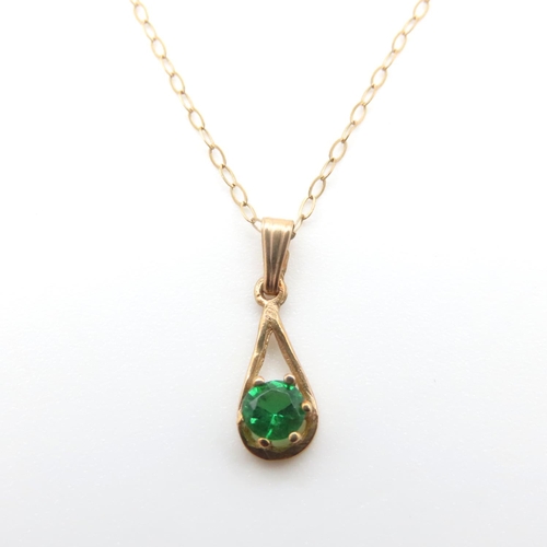 1064 - Green Cubic Zirconia Pendant Mounted in 9 Carat Yellow Gold 2cm High further set on 9 Carat Yellow G... 