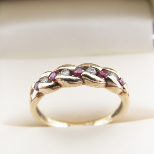 1080 - Diamond and Ruby set Braid Motif Ring Mounted in 9 Carat Yellow Gold Ring Size N and a Half