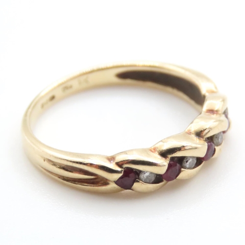 1080 - Diamond and Ruby set Braid Motif Ring Mounted in 9 Carat Yellow Gold Ring Size N and a Half