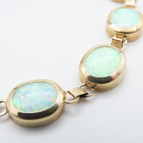 1085 - Opal set Ladies Bracelet set in 9 Carat Yellow Gold 21cm Long