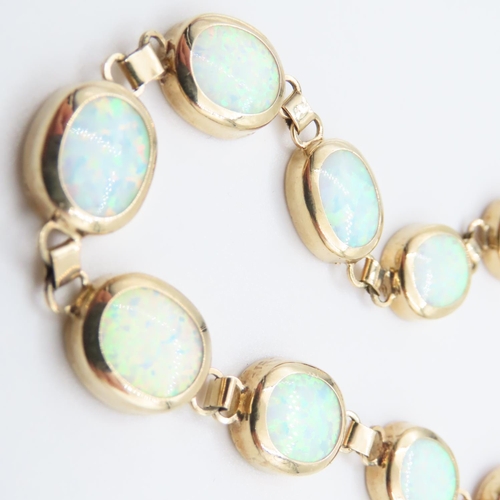 1085 - Opal set Ladies Bracelet set in 9 Carat Yellow Gold 21cm Long