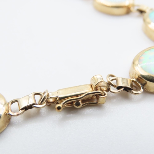 1085 - Opal set Ladies Bracelet set in 9 Carat Yellow Gold 21cm Long