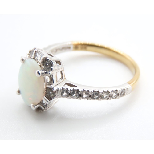 1090 - Opal and Gemstone Ladies Cluster Ring Mounted on 9 Carat Yellow Gold Ring Size M