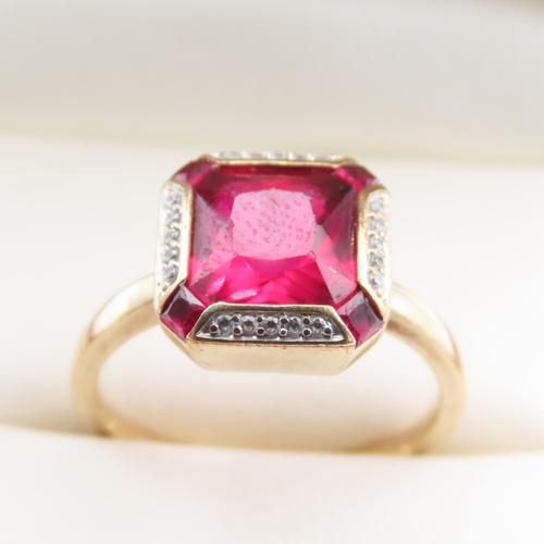 1091 - Red Spinel and Diamond set Ring Mounted on 9 Carat Yellow Gold Ring Size O