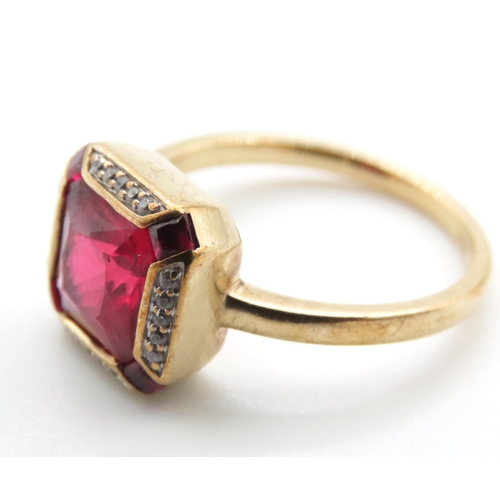 1091 - Red Spinel and Diamond set Ring Mounted on 9 Carat Yellow Gold Ring Size O