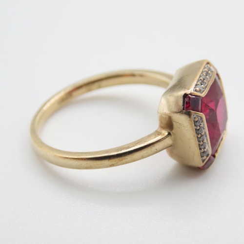 1091 - Red Spinel and Diamond set Ring Mounted on 9 Carat Yellow Gold Ring Size O