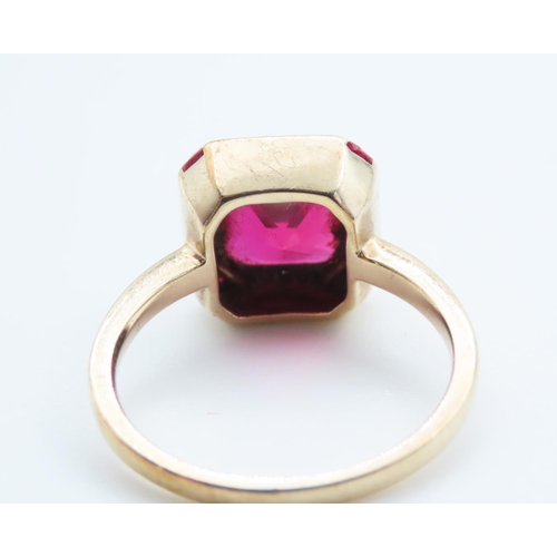 1091 - Red Spinel and Diamond set Ring Mounted on 9 Carat Yellow Gold Ring Size O