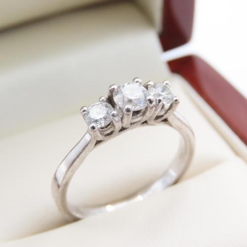 1092 - Three Stone Diamond Ring Mounted in 18 Carat White Gold Ring Size N and a Half