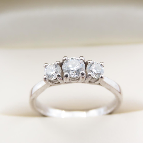 1092 - Three Stone Diamond Ring Mounted in 18 Carat White Gold Ring Size N and a Half