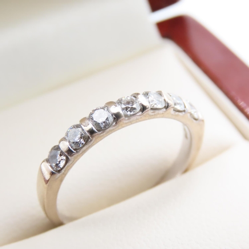 1093 - Diamond set 18 Carat White Gold Seven Stone Band Ring Size N