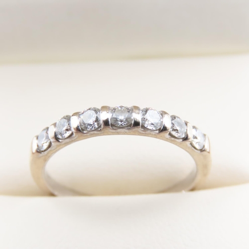 1093 - Diamond set 18 Carat White Gold Seven Stone Band Ring Size N