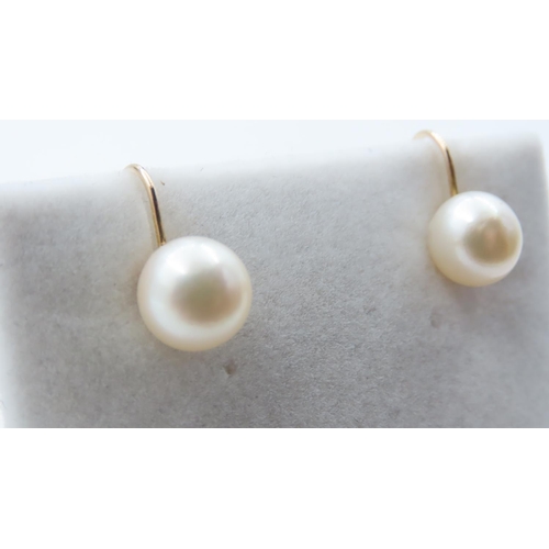 1119 - Pair of Pearl Set 9 Carat Yellow Gold Earrings