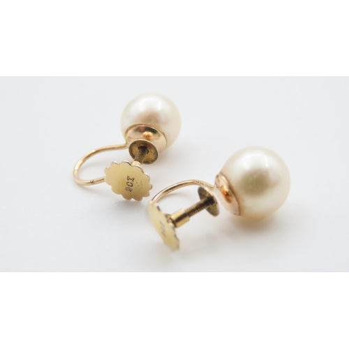 1119 - Pair of Pearl Set 9 Carat Yellow Gold Earrings