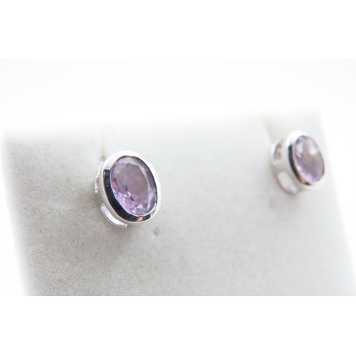 1131 - Pair of Bezel Set Amethyst 9 Carat White Gold Earrings