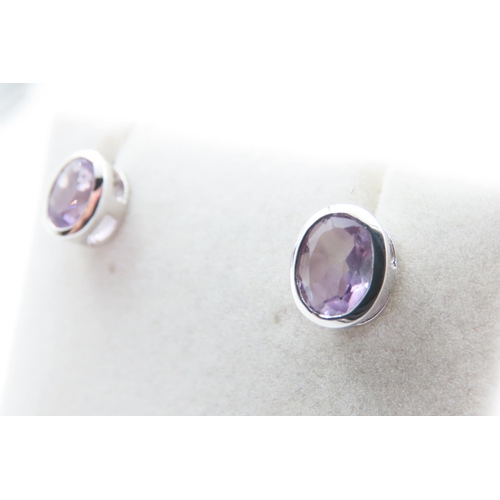 1131 - Pair of Bezel Set Amethyst 9 Carat White Gold Earrings