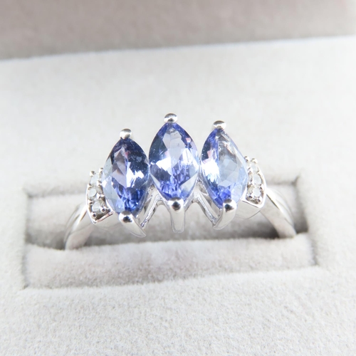 1133 - Three Stone Marquise Cut Tanzanite and Diamond Ring Mounted on 10 Carat White Gold Ring Size S