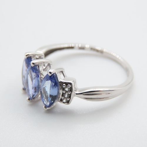 1133 - Three Stone Marquise Cut Tanzanite and Diamond Ring Mounted on 10 Carat White Gold Ring Size S