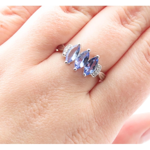 1133 - Three Stone Marquise Cut Tanzanite and Diamond Ring Mounted on 10 Carat White Gold Ring Size S