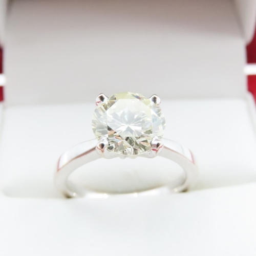 1155 - Four Claw Set Diamond Solitaire Ring Mounted on 18 Carat White Gold Band Size L and a Half Diamond W... 