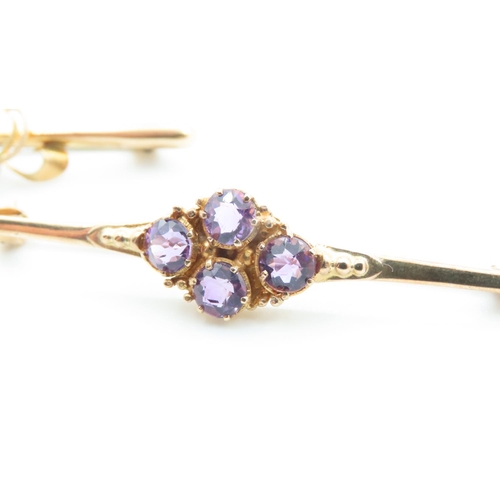 1164 - 9 Carat Yellow Gold Garnet Set Brooch and Another Amethyst Set 9 Carat Yellow Gold Brooch