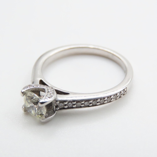 1189 - Diamond Solitaire Ring Mounted in 18 Carat White Gold with Further Diamond Inset to Shoulders Centre... 