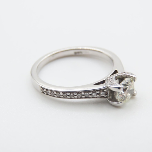 1189 - Diamond Solitaire Ring Mounted in 18 Carat White Gold with Further Diamond Inset to Shoulders Centre... 