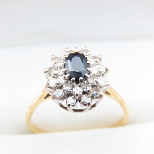 1200 - Sapphire and Diamond Ladies Cluster Ring Mounted on 18 Carat Yellow Gold Ring Size O