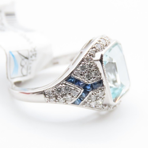 1202 - Emerald Cut Aquamarine, Diamond and Sapphire Cluster Ring Mounted in Platinum Ring Size N