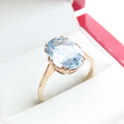 1205 - Basket Set Oval Cut Aquamarine Solitaire Ring Set in 9 Carat Yellow Gold Band Ring Size Q and a Half