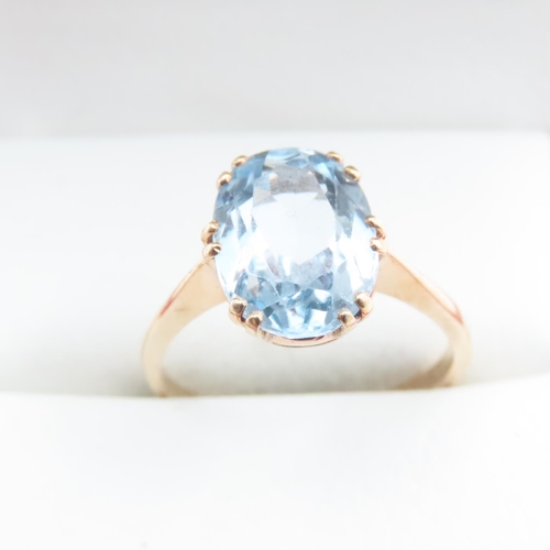 1205 - Basket Set Oval Cut Aquamarine Solitaire Ring Set in 9 Carat Yellow Gold Band Ring Size Q and a Half