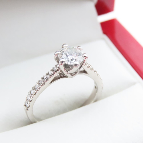 1206 - Diamond Solitaire Ring Set in Platinum with Further Diamonds Set to Shoulders Ring Size K and a Half