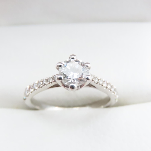 1206 - Diamond Solitaire Ring Set in Platinum with Further Diamonds Set to Shoulders Ring Size K and a Half