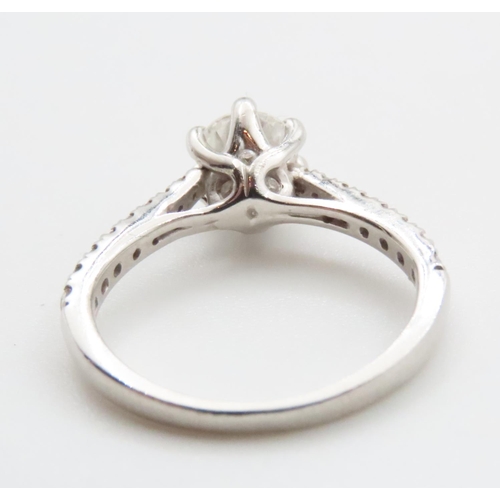 1206 - Diamond Solitaire Ring Set in Platinum with Further Diamonds Set to Shoulders Ring Size K and a Half