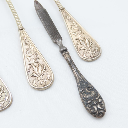 121 - Set of Four Silver Teaspoons Gilded Decoration Finely Detailed One Silver Teaspoon and Silver Handle... 