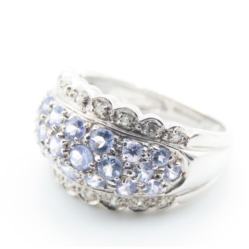 1226 - Pale Tanzanite and Diamond Set Cluster Ring Mounted in 9 Carat White Gold Ring Size L