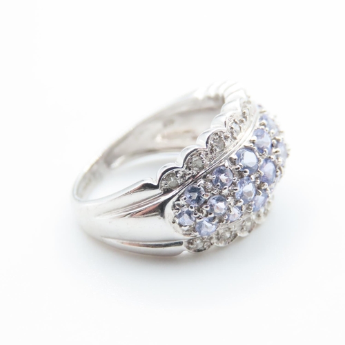 1226 - Pale Tanzanite and Diamond Set Cluster Ring Mounted in 9 Carat White Gold Ring Size L