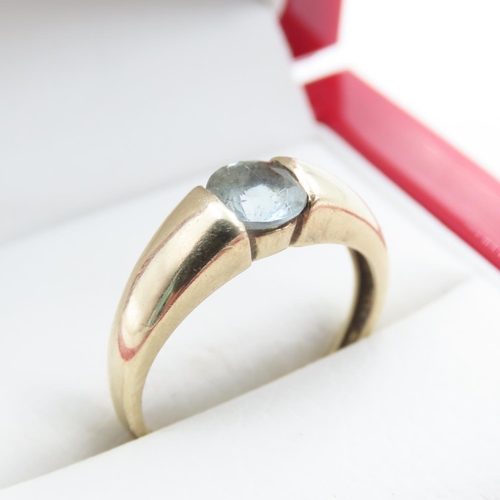 1237 - Aquamarine Single Stone Ring Mounted in 9 Carat Yellow Gold Band Ring Size O