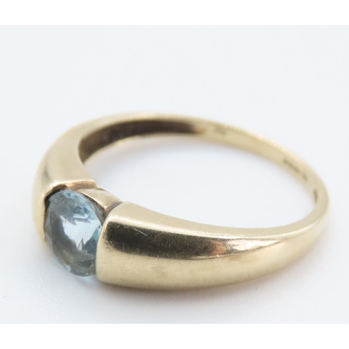 1237 - Aquamarine Single Stone Ring Mounted in 9 Carat Yellow Gold Band Ring Size O