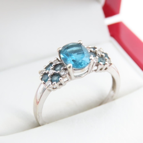 1240 - Blue Topaz Ladies Cluster Ring Mounted in 9 Carat White Gold Ring Size S and a Half