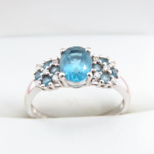 1240 - Blue Topaz Ladies Cluster Ring Mounted in 9 Carat White Gold Ring Size S and a Half