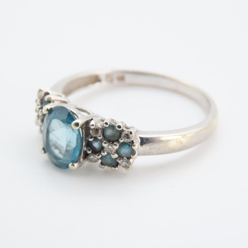 1240 - Blue Topaz Ladies Cluster Ring Mounted in 9 Carat White Gold Ring Size S and a Half