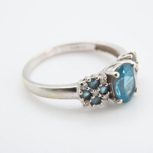 1240 - Blue Topaz Ladies Cluster Ring Mounted in 9 Carat White Gold Ring Size S and a Half