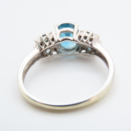 1240 - Blue Topaz Ladies Cluster Ring Mounted in 9 Carat White Gold Ring Size S and a Half