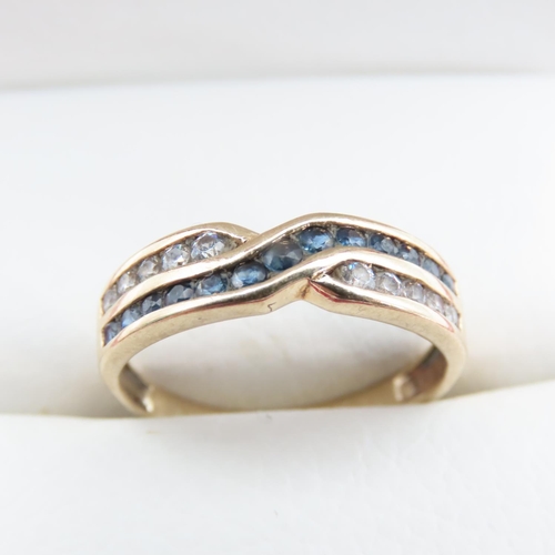 1243 - Sapphire and Gemstone Crossover Ring Mounted in 9 Carat Yellow Gold Band Ring Size M and a Half